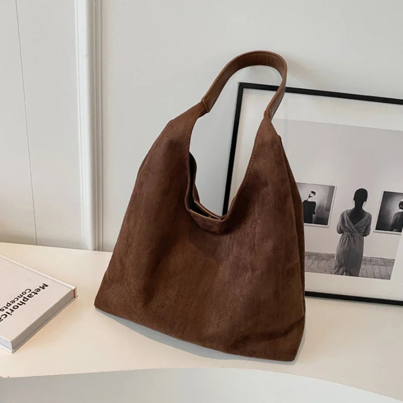 Womens slouchy tote handbag with wide shoulder strap in dark brown