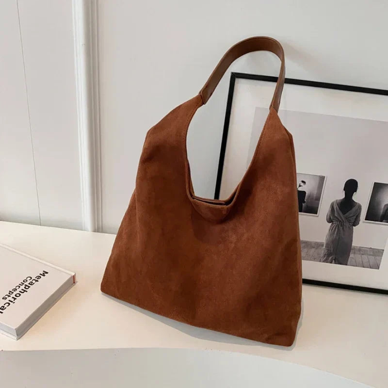 Womens slouchy tote handbag with wide shoulder strap in brown