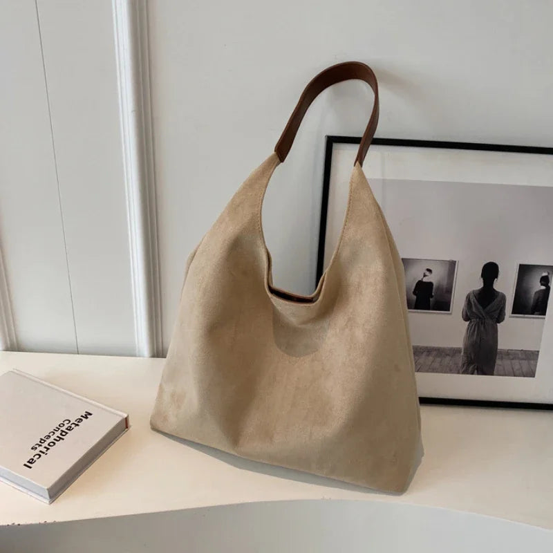 Womens slouchy tote handbag with wide shoulder strap in beige